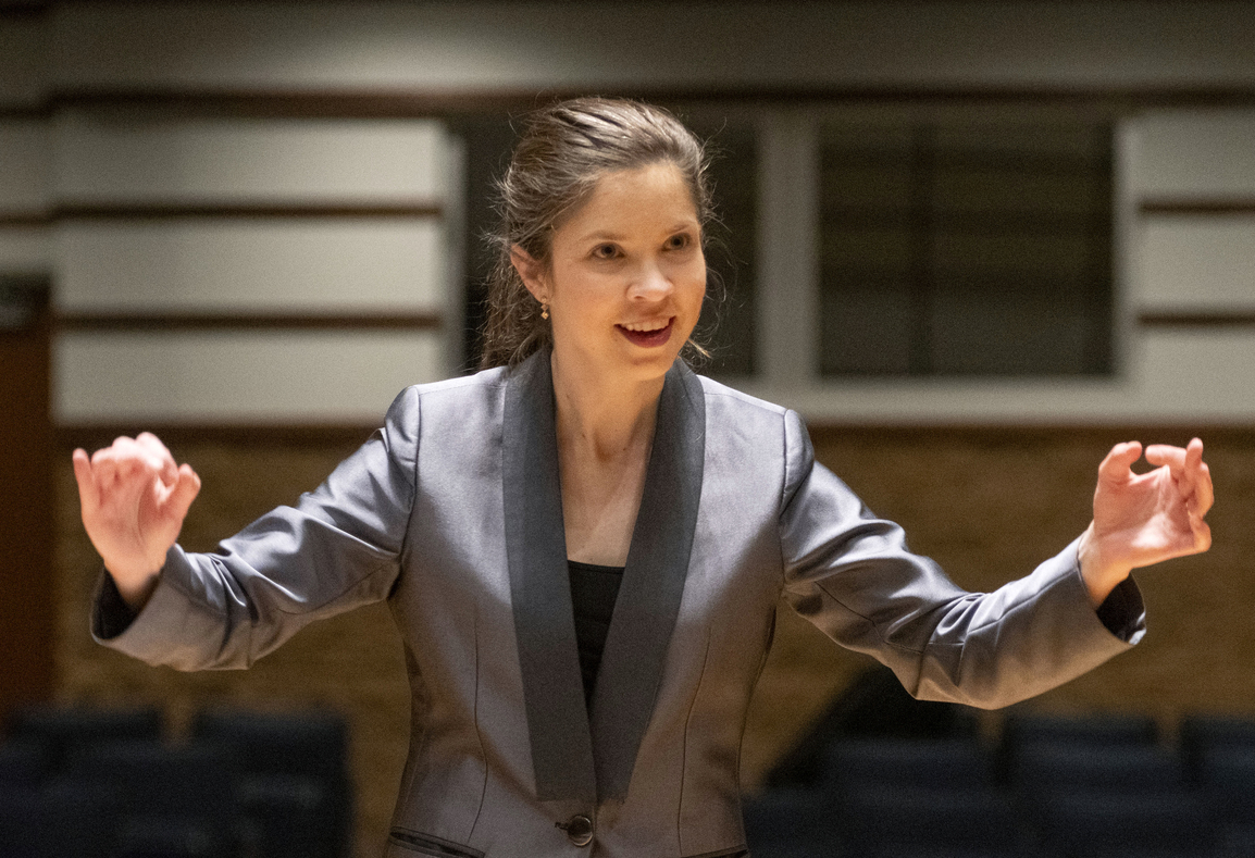 Leticia Grutzmann leads the choir ensemble